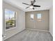 Bedroom featuring large window and neutral carpet at 9221 Steeltree St, Las Vegas, NV 89143