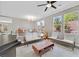 Open upstairs living space with hardwood floors, neutral color scheme, and bright windows for natural light at 9221 Steeltree St, Las Vegas, NV 89143
