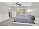 Main bedroom features large windows for lots of natural light and an ensuite bathroom at 9221 Steeltree St, Las Vegas, NV 89143