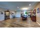 Dining room with a wood-style floor, traditional furnishings, and ample space for entertaining guests at 9511 Star Vista Ct, Las Vegas, NV 89149