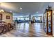 Open-concept living area with hardwood floors, spacious seating, and plenty of natural light at 9511 Star Vista Ct, Las Vegas, NV 89149