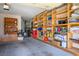 Spacious garage featuring built-in shelving, offering ample storage solutions and organization at 9536 Ruby Hills Dr, Las Vegas, NV 89134