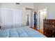 Comfortable main bedroom offering closet space, a dresser, and closet access at 9536 Ruby Hills Dr, Las Vegas, NV 89134