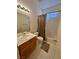 Neutral bathroom featuring a vanity, toilet, and a shower-bathtub combination at 10516 Angel Dreams Ave, Las Vegas, NV 89144