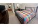 Comfortable bedroom with a large bed, mirrored closet, and carpeted floors at 10516 Angel Dreams Ave, Las Vegas, NV 89144