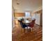 Bright dining area features wood floors and ample cabinet space at 10516 Angel Dreams Ave, Las Vegas, NV 89144