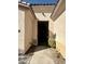 Inviting home entrance with security gate and well-maintained landscaping at 10516 Angel Dreams Ave, Las Vegas, NV 89144