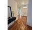 Welcoming entryway with wood floors and decorative mirror at 10516 Angel Dreams Ave, Las Vegas, NV 89144