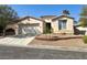 Charming single-story home boasts a well-maintained front yard and a welcoming facade at 10516 Angel Dreams Ave, Las Vegas, NV 89144