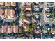 The aerial view shows Southwestern style homes and tree-lined streets in a well maintained community at 1100 Meridian Bay Dr, Las Vegas, NV 89128
