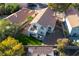 This is an aerial photograph of the back of a two story home, with a small yard, and desert landscaping at 1100 Meridian Bay Dr, Las Vegas, NV 89128