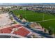 Aerial view of a large, well-maintained sports park with soccer fields and playground equipment at 1100 Meridian Bay Dr, Las Vegas, NV 89128