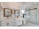 Updated bathroom boasts dual sinks and a glass-enclosed shower at 1100 Meridian Bay Dr, Las Vegas, NV 89128