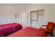 Bedroom featuring twin beds, closet, and carpet flooring at 1100 Meridian Bay Dr, Las Vegas, NV 89128