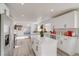 Spacious open kitchen with stainless steel appliances, center island, and white cabinetry at 1100 Meridian Bay Dr, Las Vegas, NV 89128