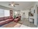 Open-concept living room with updated kitchen, providing a bright and airy atmosphere at 1100 Meridian Bay Dr, Las Vegas, NV 89128