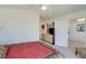 Bright, spacious main bedroom featuring neutral walls, carpet and a view into an open doorway at 1100 Meridian Bay Dr, Las Vegas, NV 89128