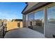 Private outdoor balcony space with sliding glass doors offers sunlight, fresh air and neighborhood views at 11297 Essence Point Ave # 102, Las Vegas, NV 89135