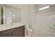 This bathroom features a single sink, a mirror, and a shower-tub combo at 11297 Essence Point Ave # 102, Las Vegas, NV 89135