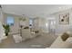 Bright bonus room featuring modern decor, neutral paint, large windows, and plush carpet at 11297 Essence Point Ave # 102, Las Vegas, NV 89135