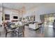 Modern clubhouse featuring fireplace, high ceilings, tile floors, and relaxing areas for residents at 11297 Essence Point Ave # 102, Las Vegas, NV 89135