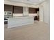 This spacious kitchen boasts stylish countertops, a center island, and stainless appliances at 11297 Essence Point Ave # 102, Las Vegas, NV 89135