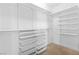 A closet is equipped with wire shelving, drawers, and carpet flooring at 11756 Emerald Lake Ave, Las Vegas, NV 89138