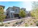 Modern two-story home showcasing clean lines, neutral tones, and contemporary landscaping at 11756 Emerald Lake Ave, Las Vegas, NV 89138