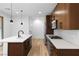Well-equipped kitchen featuring stainless appliances, white subway tile backsplash, and warm wood cabinetry at 11756 Emerald Lake Ave, Las Vegas, NV 89138