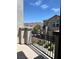 Balcony view of townhome complex, desert landscape, and blue skies at 1197 Mission View Ct, Henderson, NV 89002