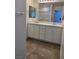 Bathroom with double vanity, and a shower over tub combo in background at 1197 Mission View Ct, Henderson, NV 89002