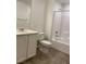 Bathroom with a single sink vanity, toilet, and shower over tub combo at 1197 Mission View Ct, Henderson, NV 89002