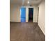 Upstairs bedroom space featuring neutral carpet and two open doorways at 1197 Mission View Ct, Henderson, NV 89002