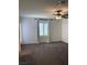 Carpeted main bedroom with neutral walls, a ceiling fan and plantation shutters at 1197 Mission View Ct, Henderson, NV 89002