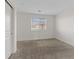 Cozy bedroom with a window and carpeted floors at 12108 Harvest Sky Way # 1, Las Vegas, NV 89183