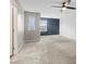 Upstairs bonus room with carpeted floors and natural light at 12108 Harvest Sky Way # 1, Las Vegas, NV 89183