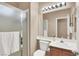 Bathroom featuring a glass shower and single sink at 1283 Peppercorn Ave, Henderson, NV 89012