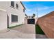 Spacious brick driveway, perfect for additional parking, enclosed by a secure gate at 1283 Peppercorn Ave, Henderson, NV 89012