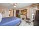 Spacious bedroom with ceiling fan, natural light, and contemporary decor at 1375 E Hacienda Ave # 114, Las Vegas, NV 89119