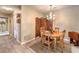 Charming dining room with wooden table set and decorative chandelier at 1375 E Hacienda Ave # 114, Las Vegas, NV 89119