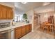 Open-concept view from the kitchen to the dining area and living room at 1375 E Hacienda Ave # 114, Las Vegas, NV 89119