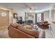 Living room showcasing a fireplace, ceiling fan, and cozy seating at 1375 E Hacienda Ave # 114, Las Vegas, NV 89119