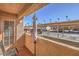 Exterior patio featuring an umbrella with views of covered parking at 1375 E Hacienda Ave # 114, Las Vegas, NV 89119