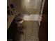 A bathroom with a white tub and toilet at 1732 Yellow Rose St, Las Vegas, NV 89108