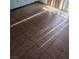 A bedroom floor with sunlight streaming through blinds at 1732 Yellow Rose St, Las Vegas, NV 89108
