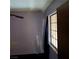 A bedroom with window and ceiling fan at 1732 Yellow Rose St, Las Vegas, NV 89108