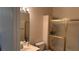 Cozy bathroom with tiled shower and updated mirror at 1947 Cutlass Dr # 0, Henderson, NV 89014