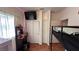 Charming bedroom features a bunk bed, built-in storage, and tiled flooring at 1947 Cutlass Dr # 0, Henderson, NV 89014