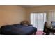 Bright bedroom with a sliding door to a balcony and comfortable seating at 1947 Cutlass Dr # 0, Henderson, NV 89014