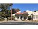 Exterior shot of the Ridgeview Village building with well-maintained landscaping at 1947 Cutlass Dr # 0, Henderson, NV 89014